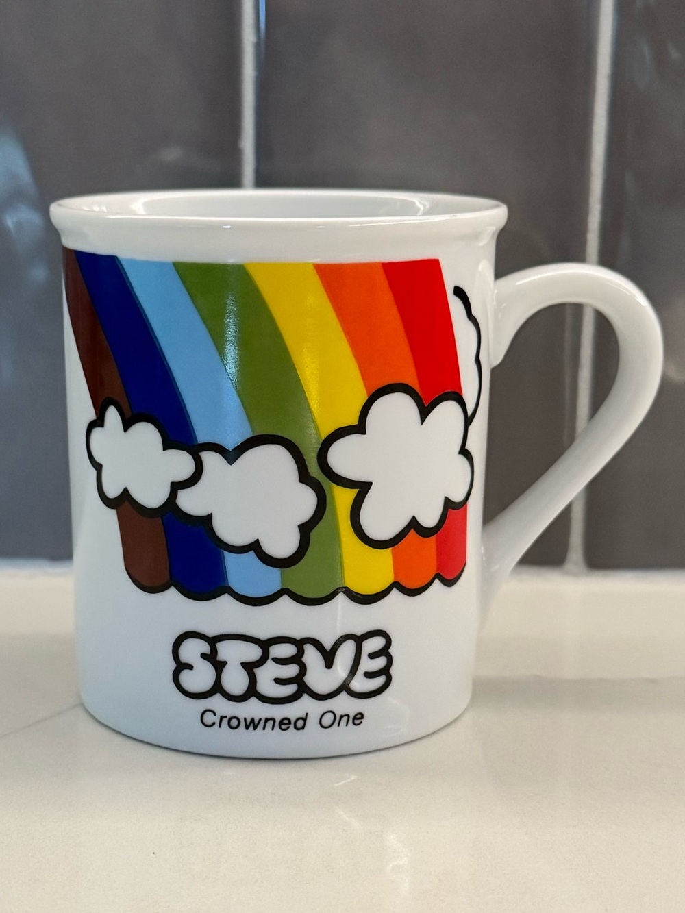 Vintage Enesco White Ceramic “Steve” Mug with Rainbow and Cloud Design